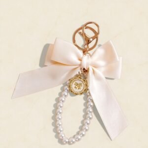 Schlüsselanhänger Schleife mit Perlen Champagner